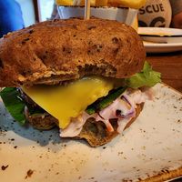 Close up of vegan burger with vegan cheese at Greyfriars Inn in St Andrews