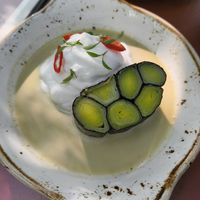 Leek with nori, coconut crème mousse and green curry sauce at Café du Midi in Delfgauw