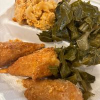 Drummies, collard greens, and Mac n cheese  at Dodah's Kitchen in Waldorf