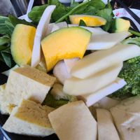 Mushrooms, pumpkin, bok choy and tofu to add to broth at Hot Pot Legend in Ashburn