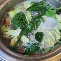 Veggie hot pot cooking at Hot Pot Legend in Ashburn