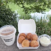 Iced oat latte and plain dippin donuts  at Sunday Vegan in Tokyo