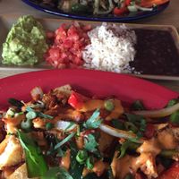 Tofu scramble, seitan & smoked tofu fajitas, and all the fajita accompaniments.   at Dos Segundos Cantina in Philadelphia