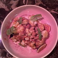 Cauliflower with figs  Photo looks pink due to heat lamp outside.   at Agora DC in Washington