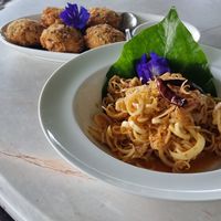 The first boal is Banana Blossom which I've never had before The bowl at the back deep fried tofu cakes.


Both were amazing... at Sweet Sisters Cafe in Koh Samui