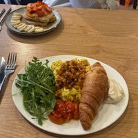 Vegan breakfast plate and pancakes. at ZEITGEIST Café in Lyon