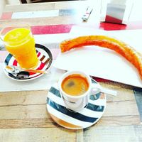 Porras, churros, café sólo, zumo de naranja natural. at Churrería Tejeringos in Tomelloso