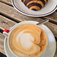Chocolate croissant with cappuccino at 4 Amici al Bar in Livorno
