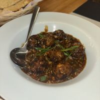 Manchurian. Vegetable balls dipped in spicy gravy   at Mokshu Vegetarian Cuisine in Canggu