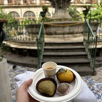 pistacchio conchiglia, coffee and almond sweet and a “mandarino"  at I Segreti del Chiostro in Palermo