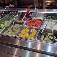 Choose unlimited fresh toppings for tacos at Tlacoyo Mexican Grill in Deerfield