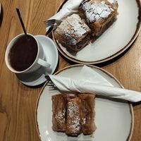 hot chocolate with an apple pie and a cherry pie. at Shambhala Bakery in Zabljak