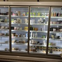 Refrigerated section with vegan yogurts, cheeses, meats, etc  at Health Zone in South West London