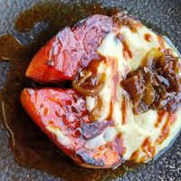 Grilled watermelon in BBQ sauce with "veganised" potato puree and caramelised onion at Osteria Del Vicario in Certaldo