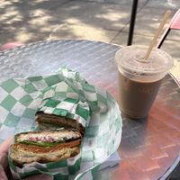 Foccaciaboutit sandwich with ice chai latte  at Yough in Brooklyn