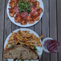 Two vegan main dishes: Palmwedel vegan sandwich and Sweet potatoes at Palmwedel in Vienna