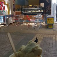 Ice cream with sneaky pigeon at Sugar Killer - Georgiou Olympiou in Athens