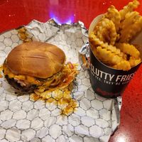 Super Slut burger and fries at Slutty Vegan in Dallas