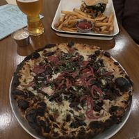 Mushroom pizza w/vegan cheesee  at Strangebird in Rochester