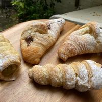 Pistachio and nutella croissants, and chocolate and pistachio cannoli at Take A Bite And Smile in London