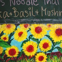 The colourfufl chalkboard menu  at Anchan Vegetarian Restaurant in Chiang Mai