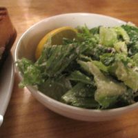 The popular Caesar salad with cashew-based dressing and tempeh bacon. at Resonance Cafe in Montreal