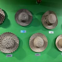 Wall decor with hats at El Trapiche - Albrook Mall in Panama City