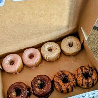 2 strawberry, 2 french toast, 2 chocolate, 2 caramel bliss. All vegan and GF at Parlor Doughnuts in Jacksonville Beach