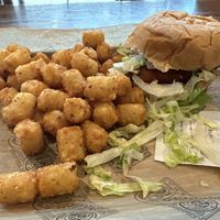 Fried chick’n sandwich with tator tots  at The Pharmacy Burger in Nashville