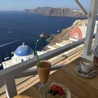 Acai bowl and smoothie. Fantastic views   at Terpsi n Oia in Oia