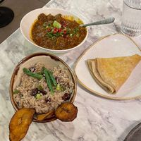 Jerk goat, rice and beans, fried plantainn  at Meat The Vegans in North West London
