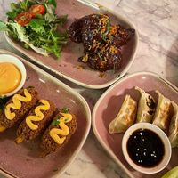 Bbq "chicken" wings (top), gyoza and jackfruit drumsticks at Meat The Vegans in North West London
