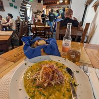 Vegan feijoada with bread and peach ginger soda. Pretty tasty and huge portion! at A Tasca in Sao Miguel