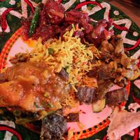 Combo of dishes, the Garlic Chilli Masala is the red one pictured in the background. at Kashmir Indian Restaurant in Christchurch