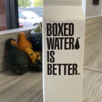 Boxed water 💚  at Greens and Grains in Voorhees