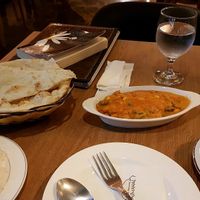 Basmati rice, garlic naan, mix veggie curry and chai masala. at Rajmahal in Jeju