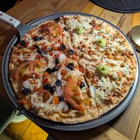 Half and half vegan pizza at eslais pizza in Villa De Leyva