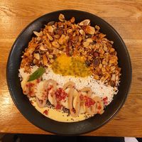 mango smoothie bowl at Booch Cafe in Riga