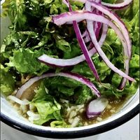 Tacos dorados rellenos de papa ahogados en salsa.  at Empathy Vegan Food in Mexico City