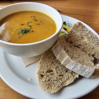 Roast butternut and curried sweet potato soup with warm sourdough and flora spread at Wildheart Animal Sanctuary Cafe in Sandown