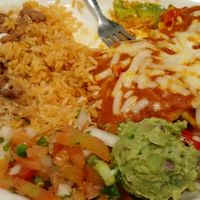 Vegan Enchiladas with added vegan chicken and guacamole instead of avo slices. at Pepito's in Riverside