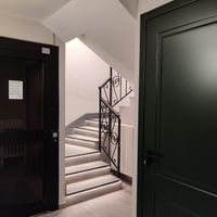 Stairs and lift down to the toilets at Il Centrale Stresa in Stresa