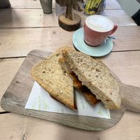 Vegan sausage sandwich  at Cheam Park Caffè in Sutton