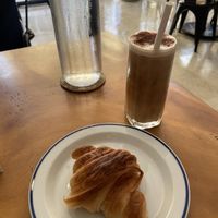 Croissant and Iced Cappucino with Oatmilk  at Sundays  in Phnom Penh