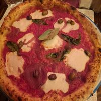 Vegan Margarita with Olives and caramalized Onions at Pizzium in Bologna