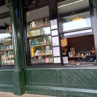 Front window where you order food & drinks & various products. at Prism Coffee in Gateshead