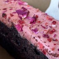 Chocolate truffle cake with raspberry rose and champagne icing   at Prism Coffee in Gateshead