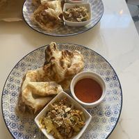 Roti canai (flaky flatbread) , achar (pickled veg), curry dipping sauce   at Singapore Coffee House in Edinburgh