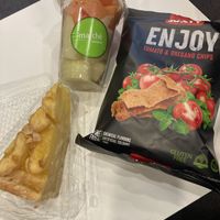 Apple cake, melon pot, and crisps. All vegan confirmed    at PRG - Zigolini Caffe a Bar - T1 in Prague