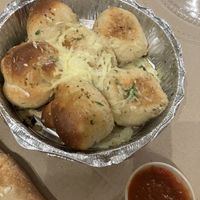 Garlic knots with vegan cheese  at Famous Joe Pizzeria in Brooklyn